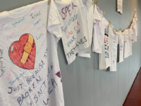 Clothesline Project shirts hanging on a line